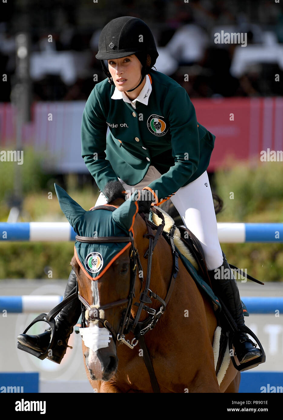 Berlin, Germany. 29th July, 2018. Equestrian sports/jumping, Global Champions Tour: Jessica Springsteen from the USA, on RMF Swinny du Parc jump over an obstacle. Credit: Britta Pedersen/dpa-Zentralbild/dpa/Alamy Live News Stock Photo