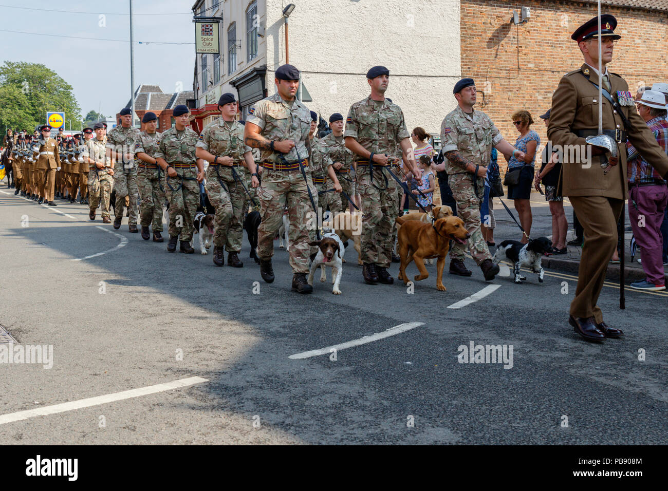 Melton Mowbray, Leicestershire,England, UK. 27th July 2018. The Royal Army Veterinary Corps (RAVC) parading through the market town. This year marks the centenary of the corps, 1918 to 2018. Stock Photo
