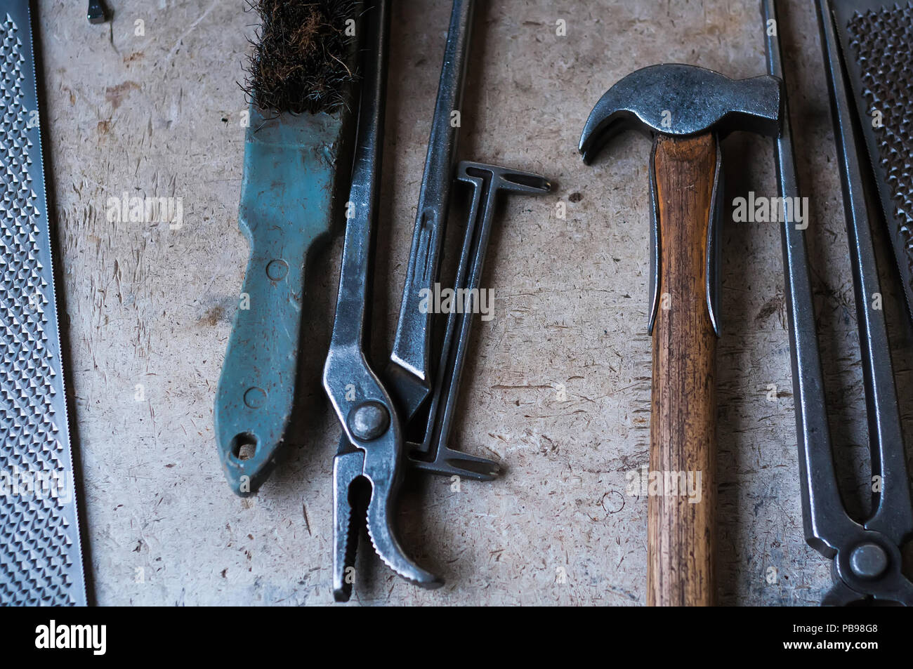 Metal tools and equipments of the blacksmith for horse shoeing in the