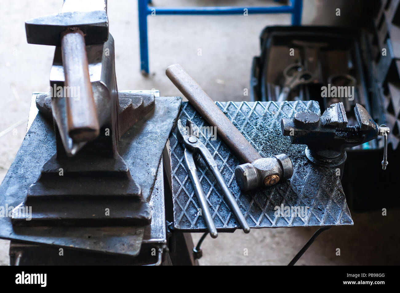 Metal tools and equipments of the blacksmith for horse shoeing in the