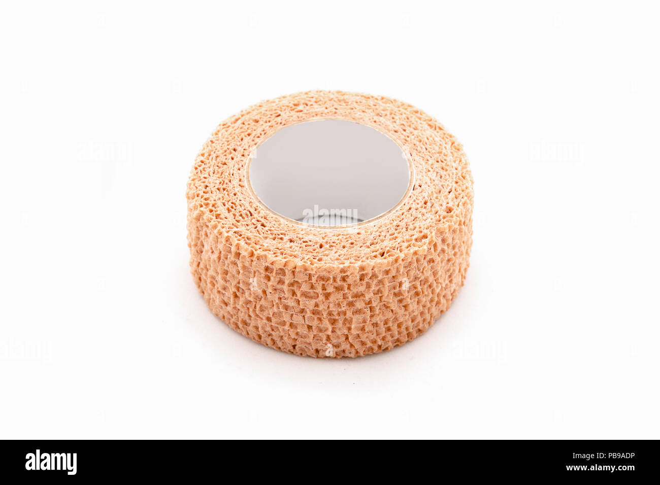 Isolated medical gauze roll bandage on white background Stock Photo - Alamy