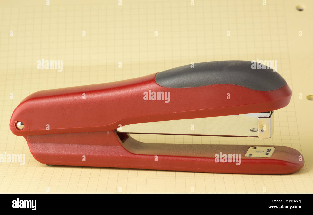 new stapler for stapling papers on a table Stock Photo