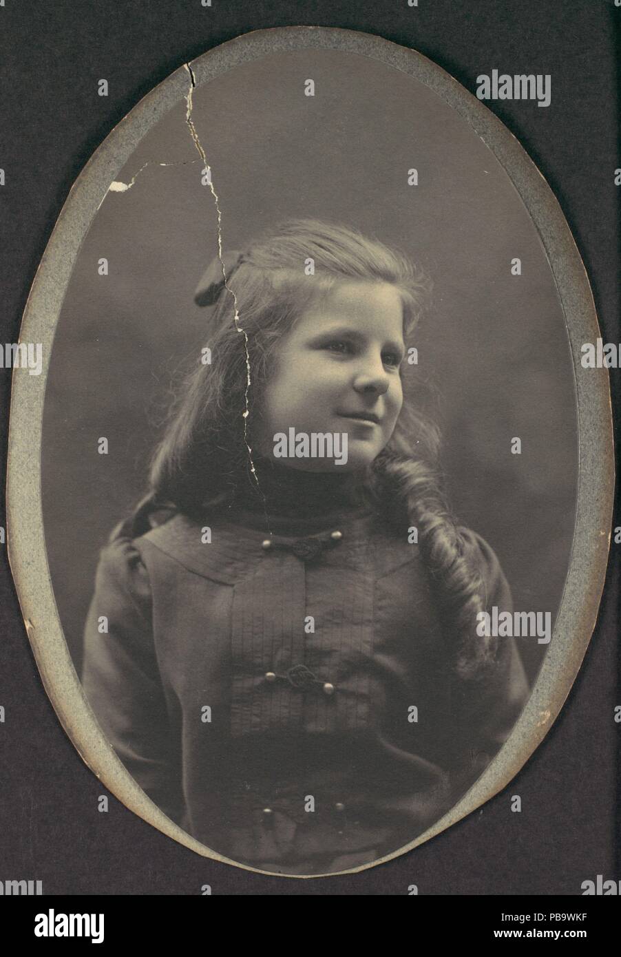 [Girl with Ringlets, Half Length]. Artist: Frederick Gutekunst (American, born Germany, 1832-1917). Dimensions: 14.4 x 9.4 cm. (5  11/16  x 3  11/16  in.). Date: 1890s. Museum: Metropolitan Museum of Art, New York, USA. Stock Photo