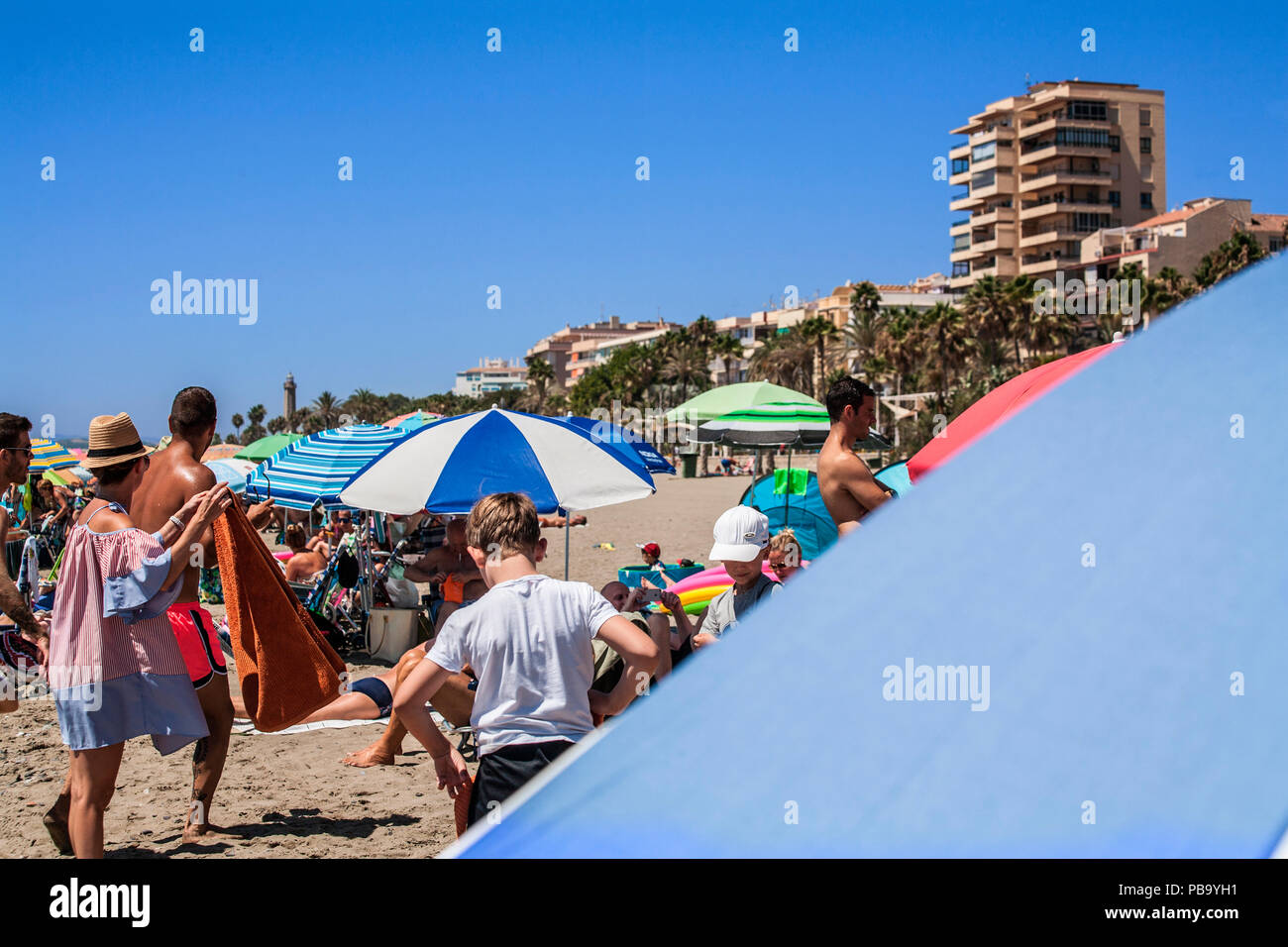 crowded 'la Rada' beach in Estepona,Spain Stock Photo