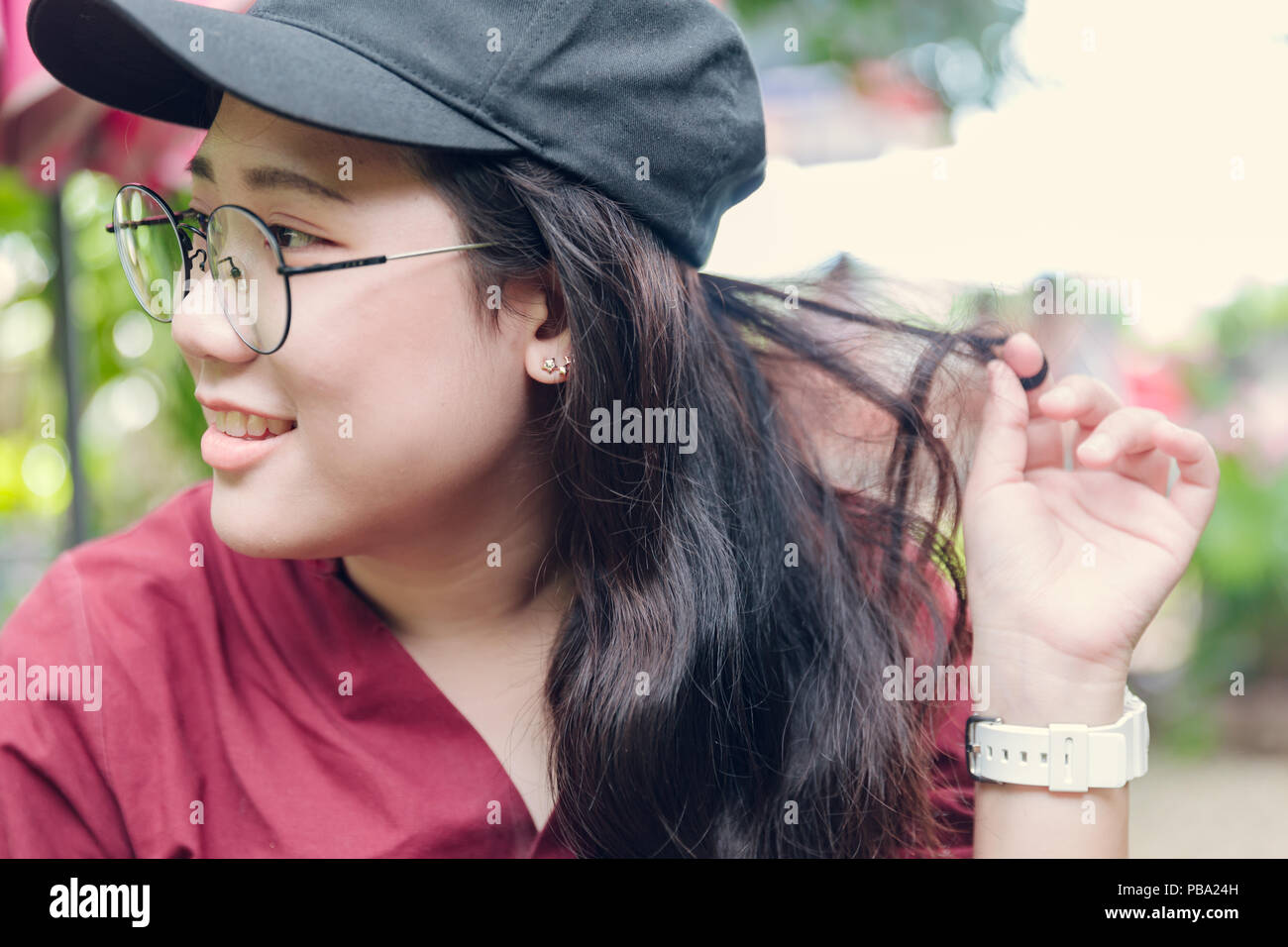 Trichotillomania or hair pulling disorder in mental health problem unconscious in teenager Stock Photo