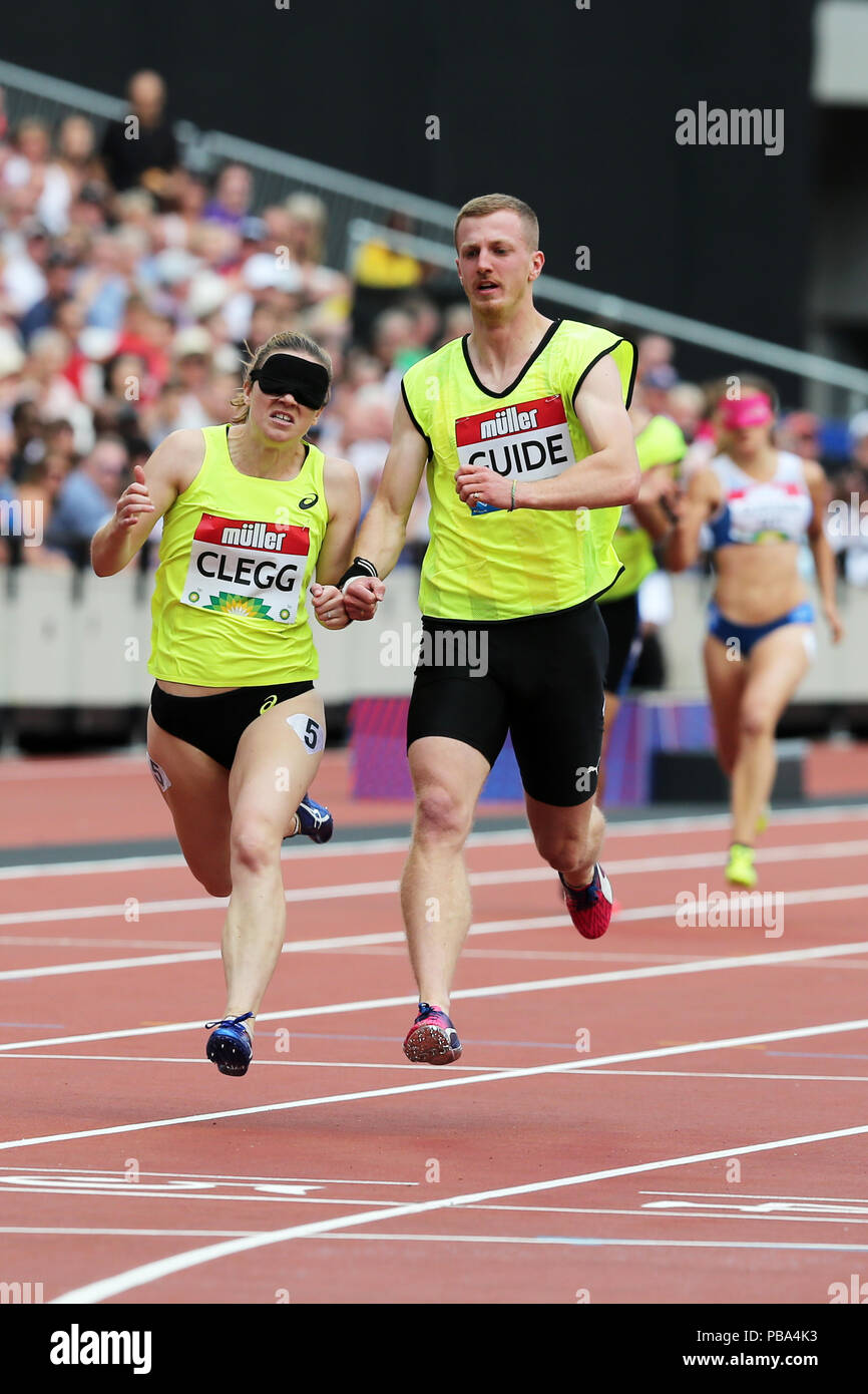 Libby CLEGG (Great Britain) with guide Tom SOMERS crossing the finish line in the Women's 200m ...