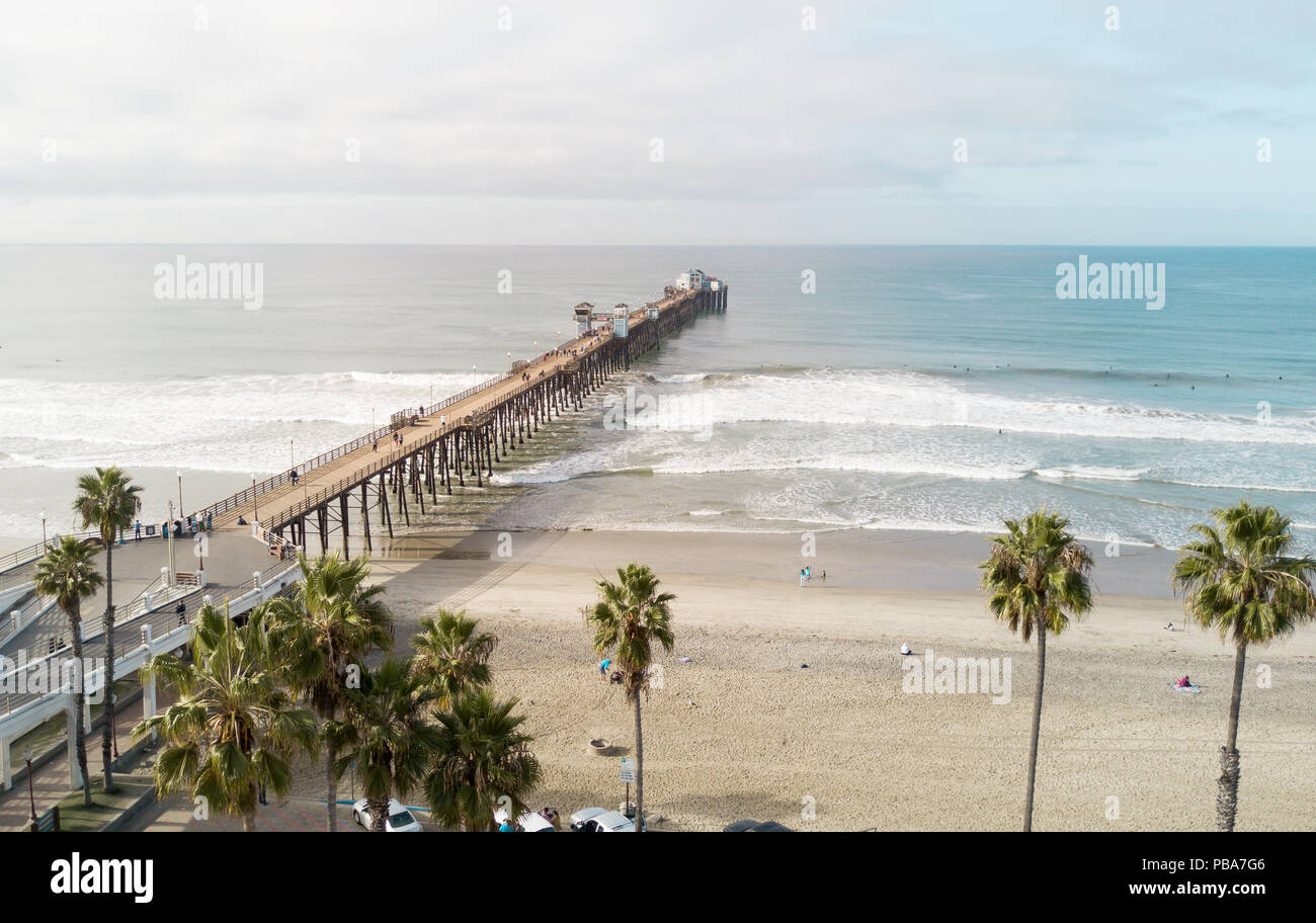 OCEANSIDE, California (EUA) - November 10, 2017: Drone shot of the longest wooden maiden pier of the USA West Coast, Oceanside Pier. Stock Photo