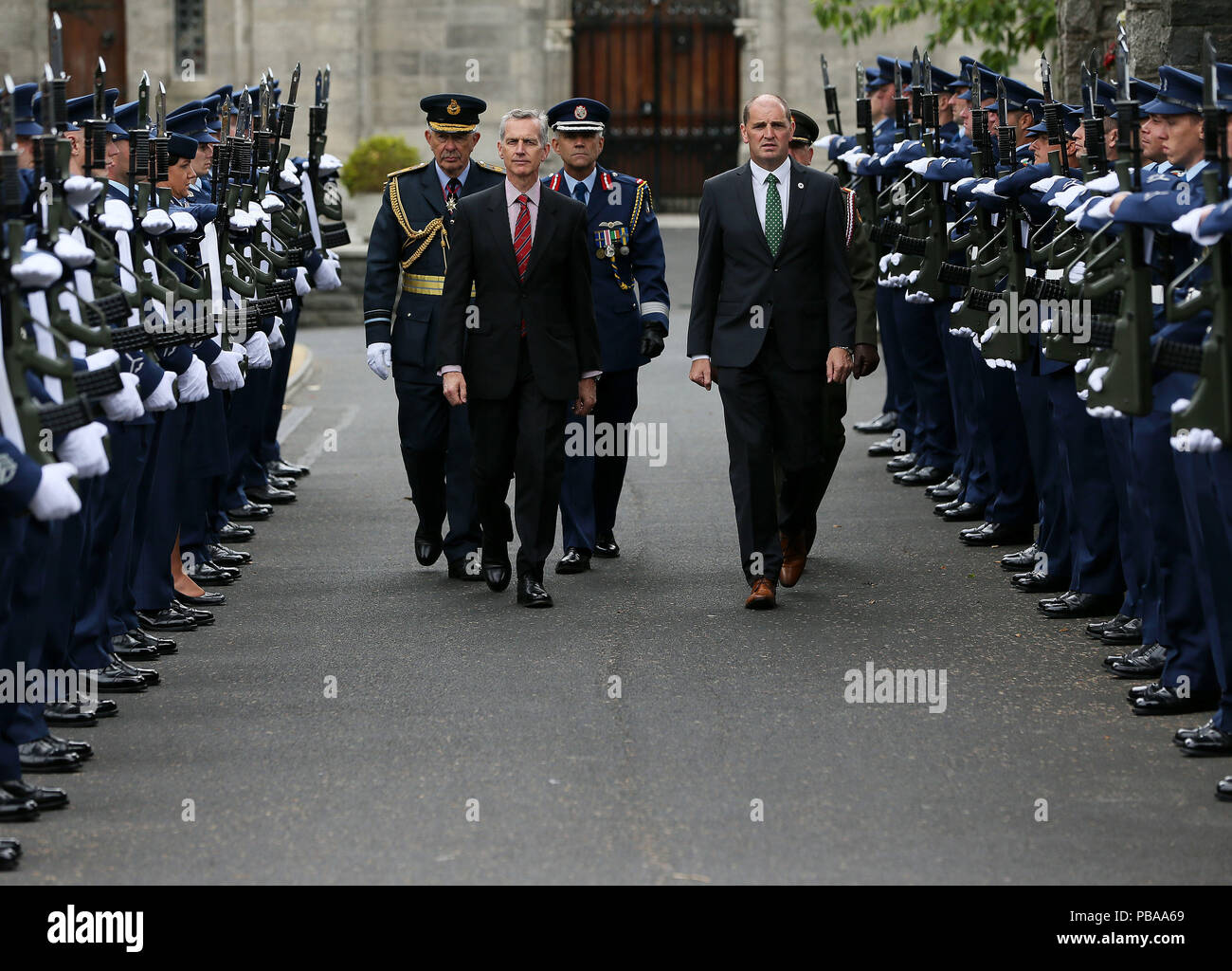 Minister with responsibility for Defence Paul Kehoe (right) and Sir Stephen Hillier (second left), Air Chief Marshal, the Chief of the Air Staff in the UK, arrive for the ceremony to mark the unveiling of a Victoria Cross Stone in Glasnevin Cemetery, Dublin, dedicated to Major Edward &Ograve;Mick&Oacute; Mannock V.C. Stock Photo