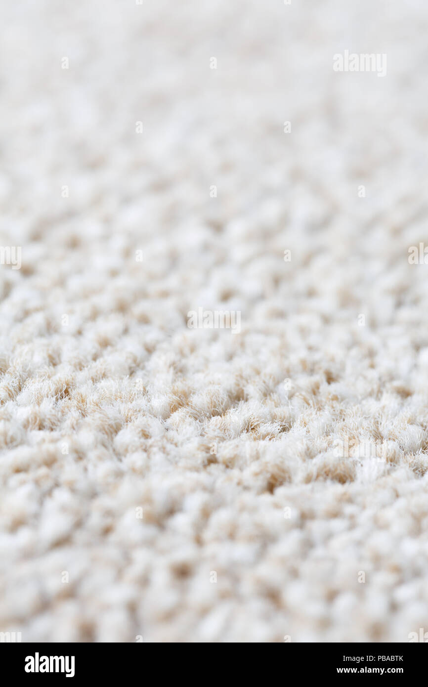Cream wool carpet rug texture close up Stock Photo