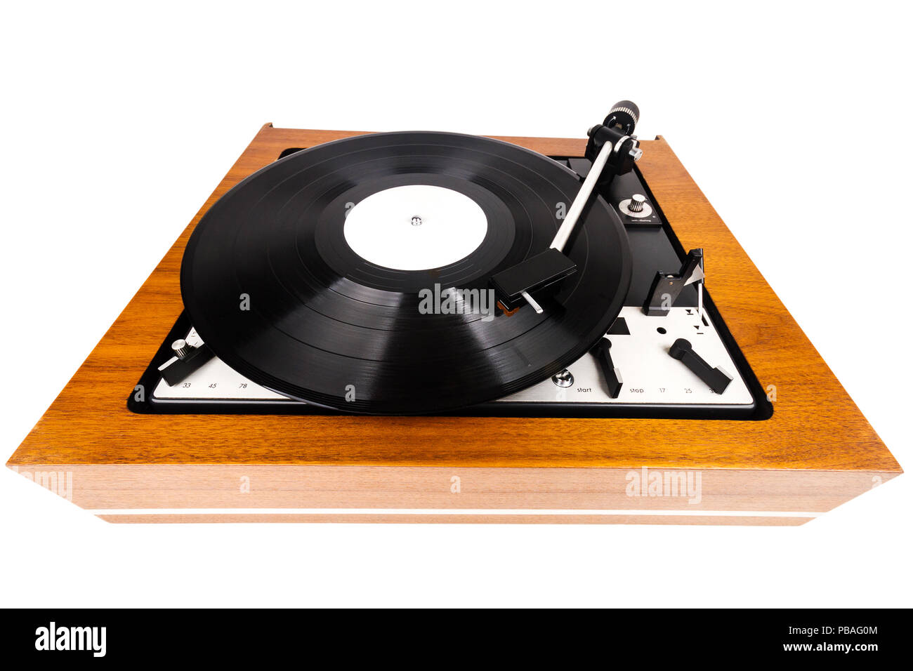 Vintage turntable vinyl record player isolated on white. Wooden plinth ...