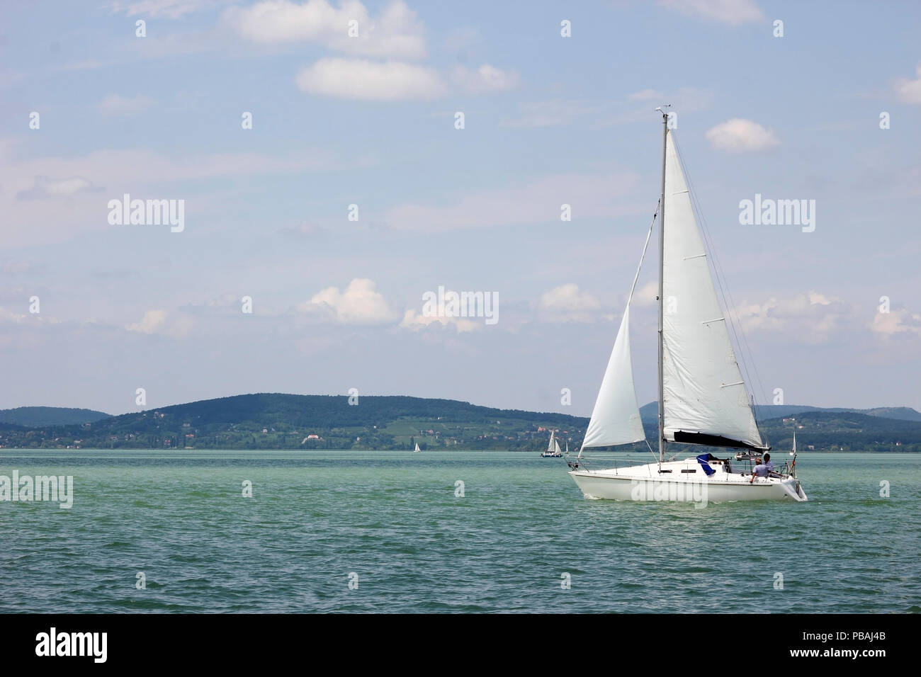 White sailboat on Balaton lake Stock Photo