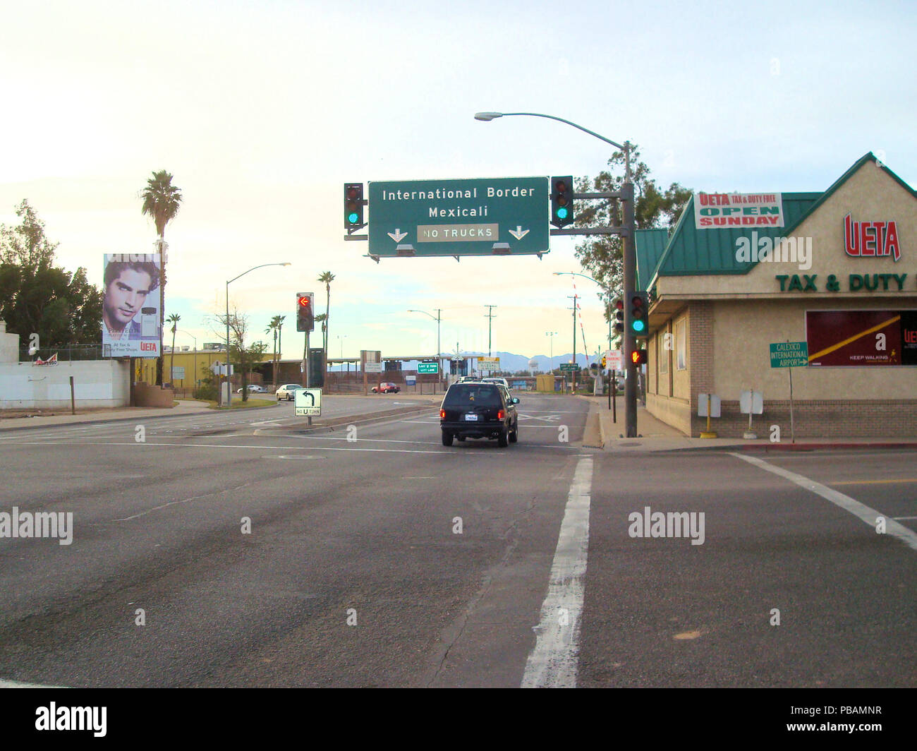 Sign on Imperial Avenue pointing car riders towards Mexicali, Mexico at