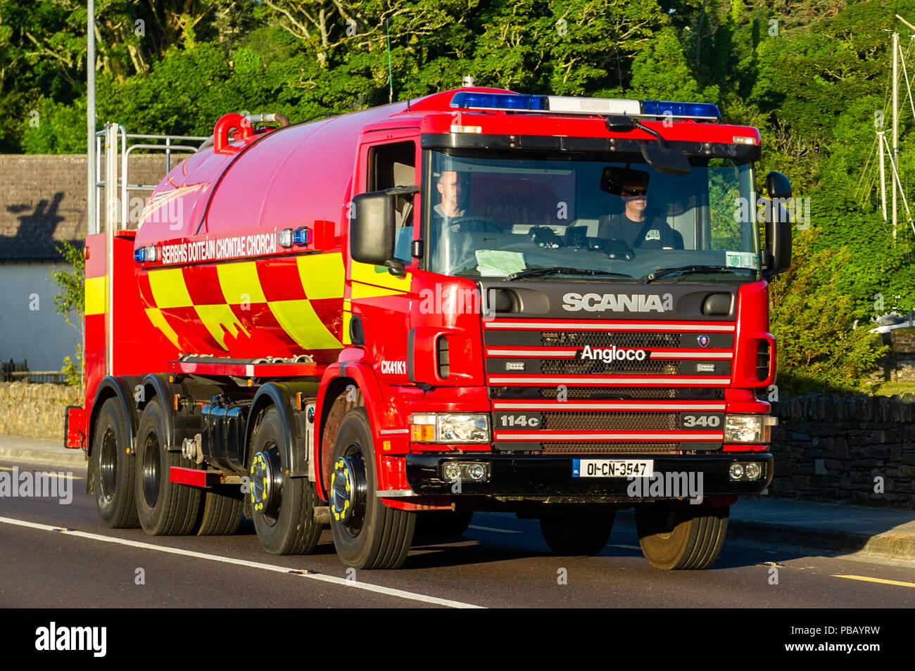 County Cork Fire Service Water Tanker drives along a road in Bantry, West Cork, Ireland. Stock Photo