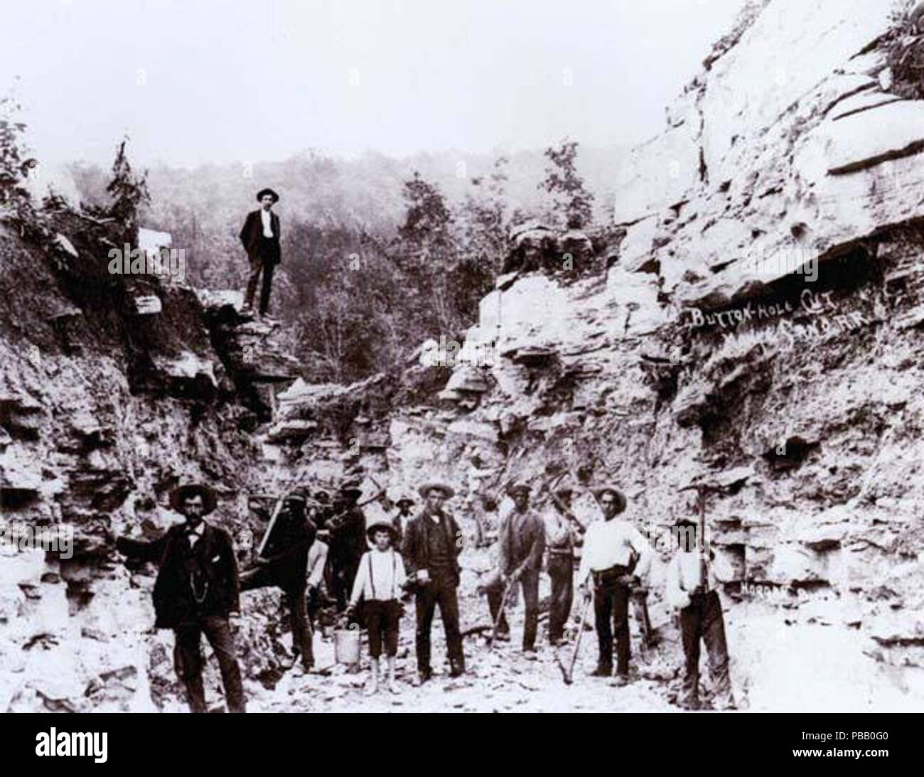 . Railroad workers cut the road bed, later named the 'Buttonhole,' down a hill for the Monte Sano Railway, which was completed in 1889. All work was done by hand and the use of gunpowder. 1880s 1055 Monte Sano Railway construction Stock Photo