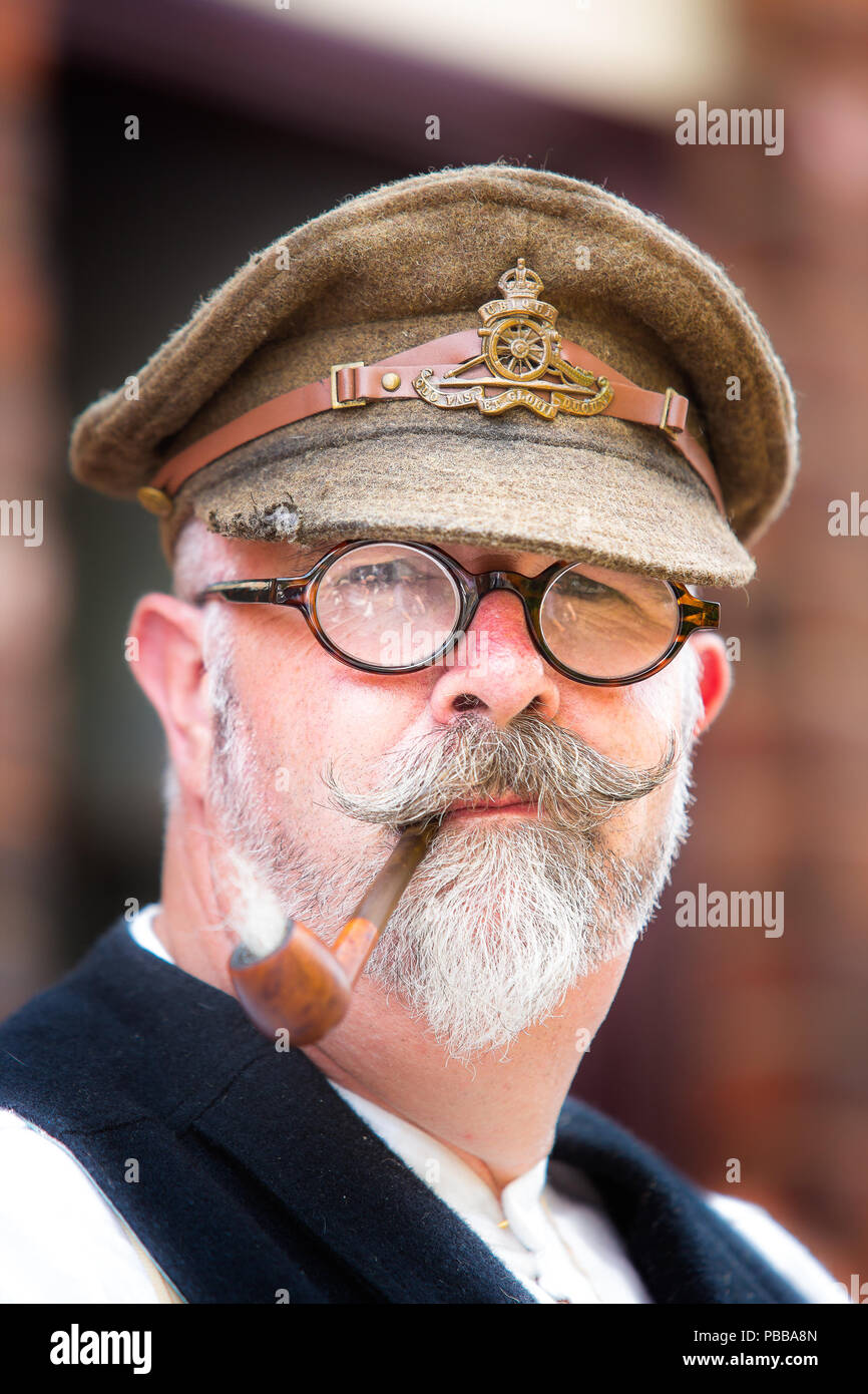 Close-up, front view portrait of distinguished gentleman wearing military peaked cap at Black Country Museum 1940's weekend, summer 2018. Stock Photo