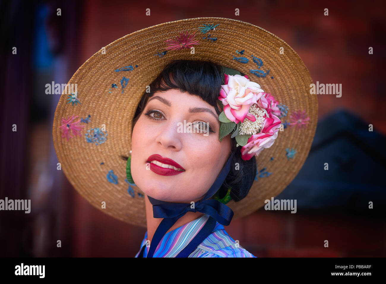 Red wide brimmed hat hi-res stock photography and images - Alamy
