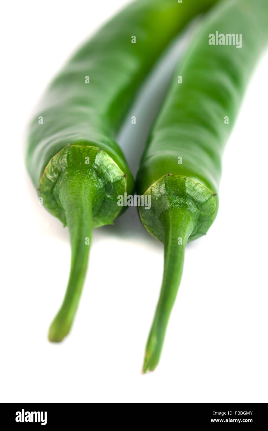 Green chili peppers. Isolated on white background Stock Photo - Alamy
