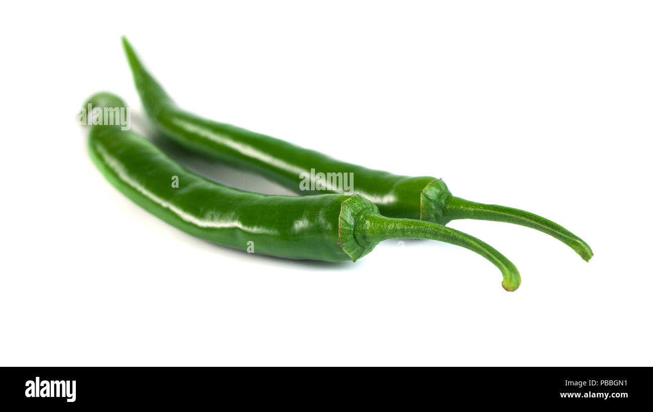 Green chili peppers. Isolated on white background Stock Photo - Alamy
