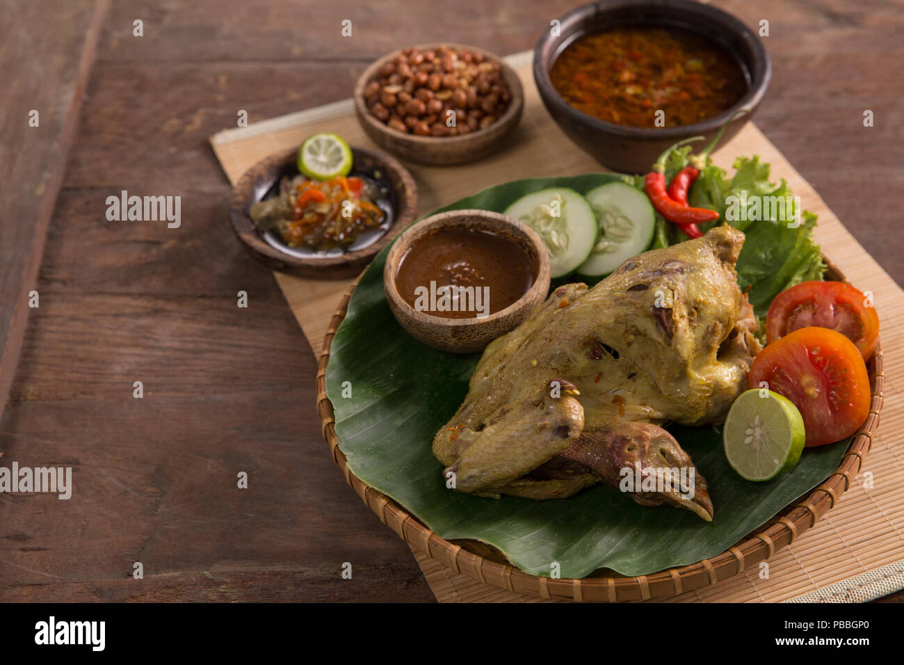 indonesian traditional culinary ayam betutu Stock Photo - Alamy
