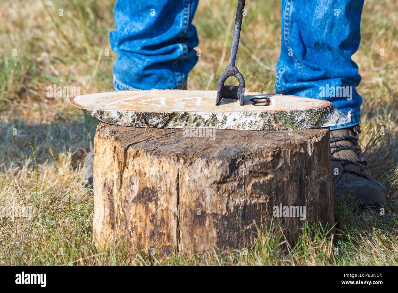 Branding Buddy on piece of timber to produce name plate at the New