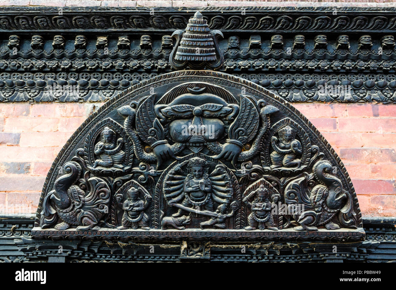 Newari architecture, wooden carvings adorning buildings in Basantapur Durbar Square, Kathmandu, Nepal Stock Photo