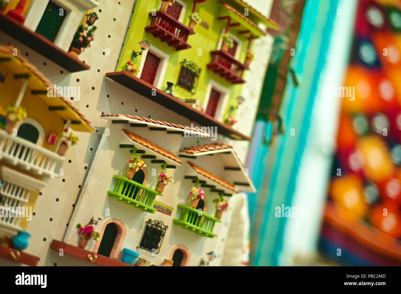 Traditional Colombian clay houses for sell at a local store Stock Photo