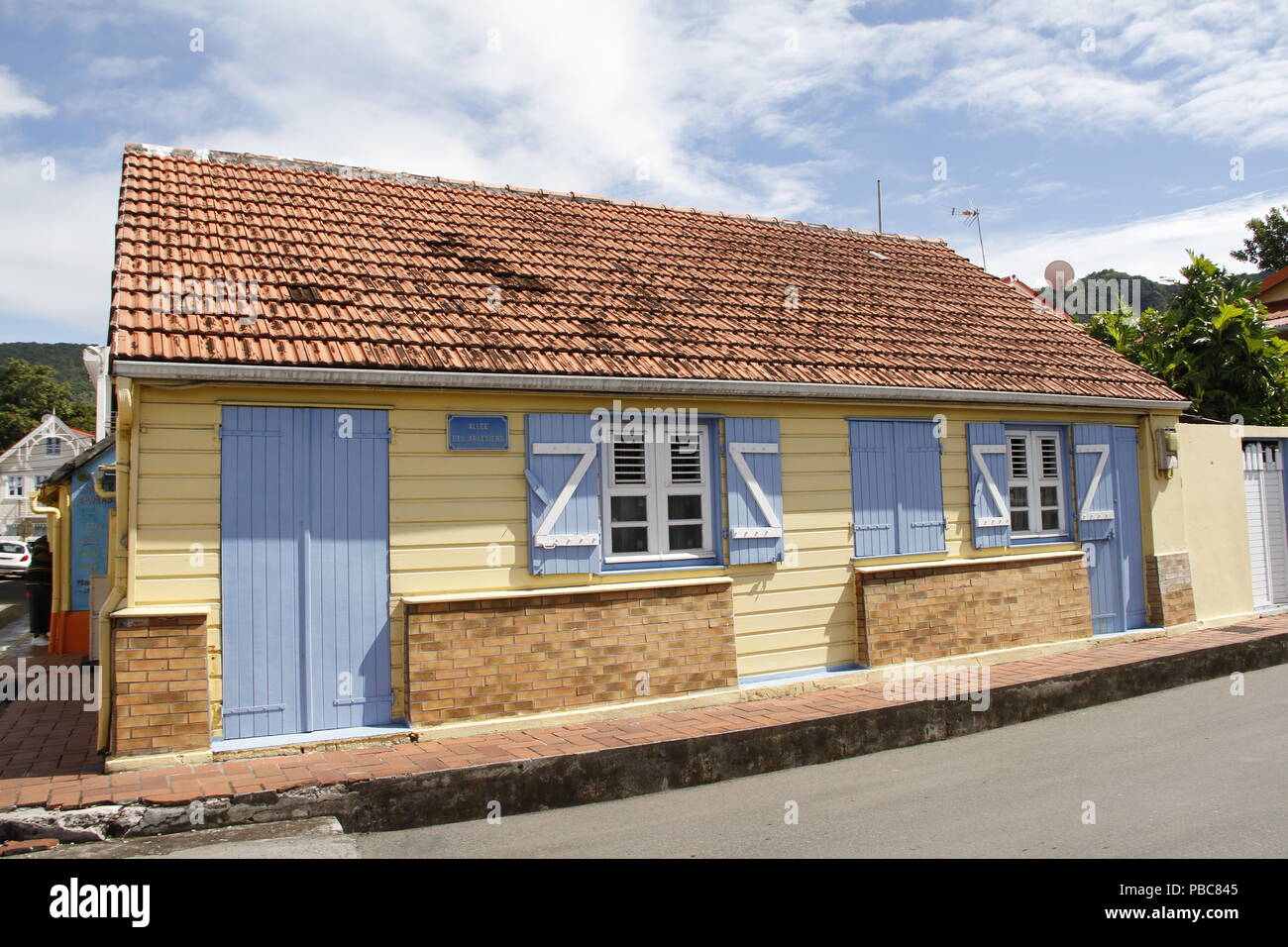 Cute yellow home on Allee des Arlesiens in Les Anses d'Arlet village