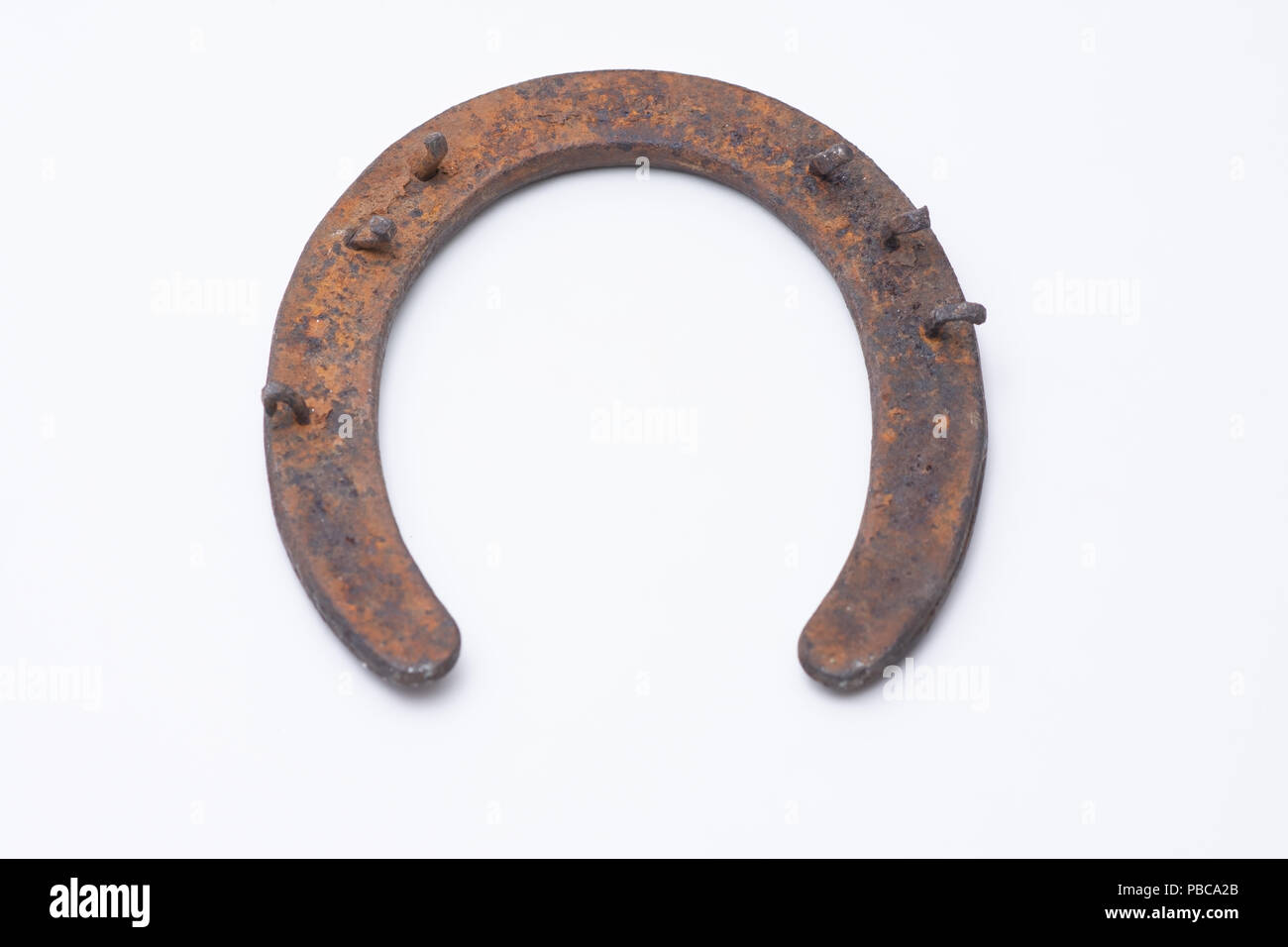 Old rusty horseshoe on USA patriotic background with room for text Stock Photo