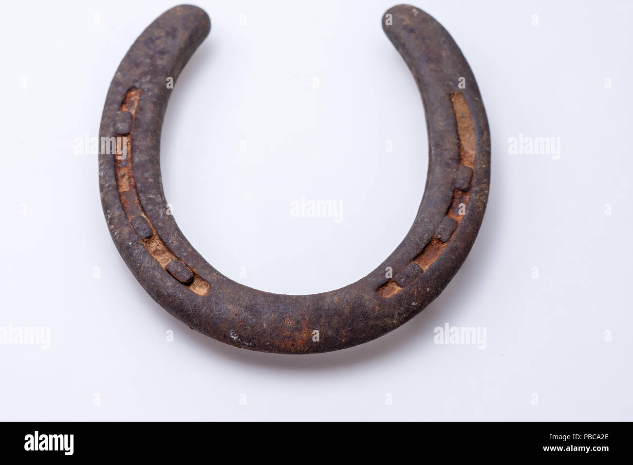 Old rusty horseshoe on USA patriotic background with room for text Stock Photo