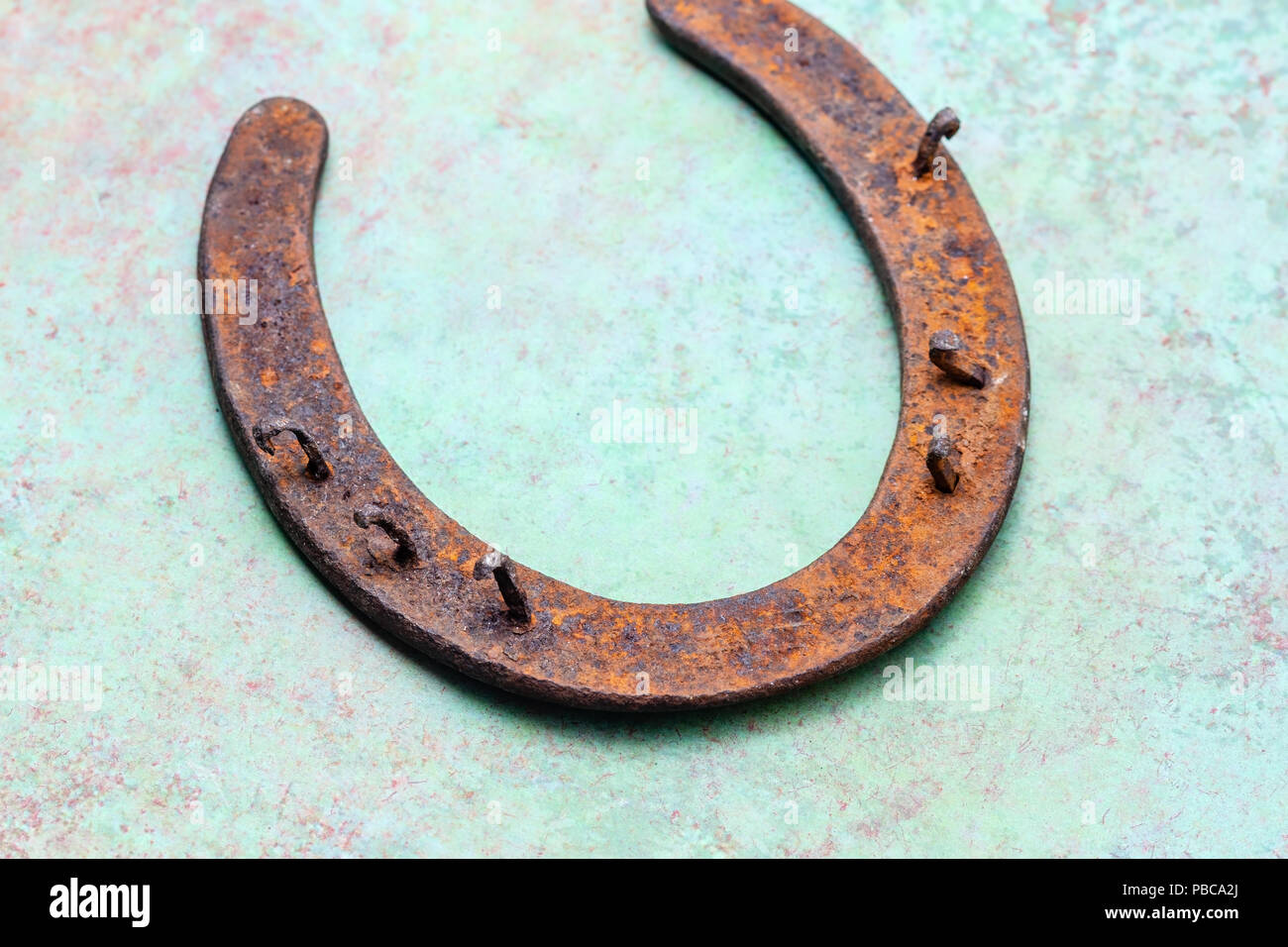 Old rusty horseshoe on USA patriotic background with room for text Stock Photo