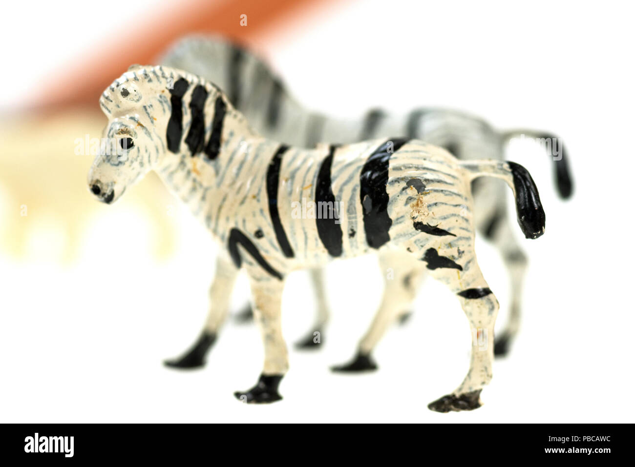 Toy zebras from a vintage Noah's Ark play set, photographed on a white  background Stock Photo - Alamy