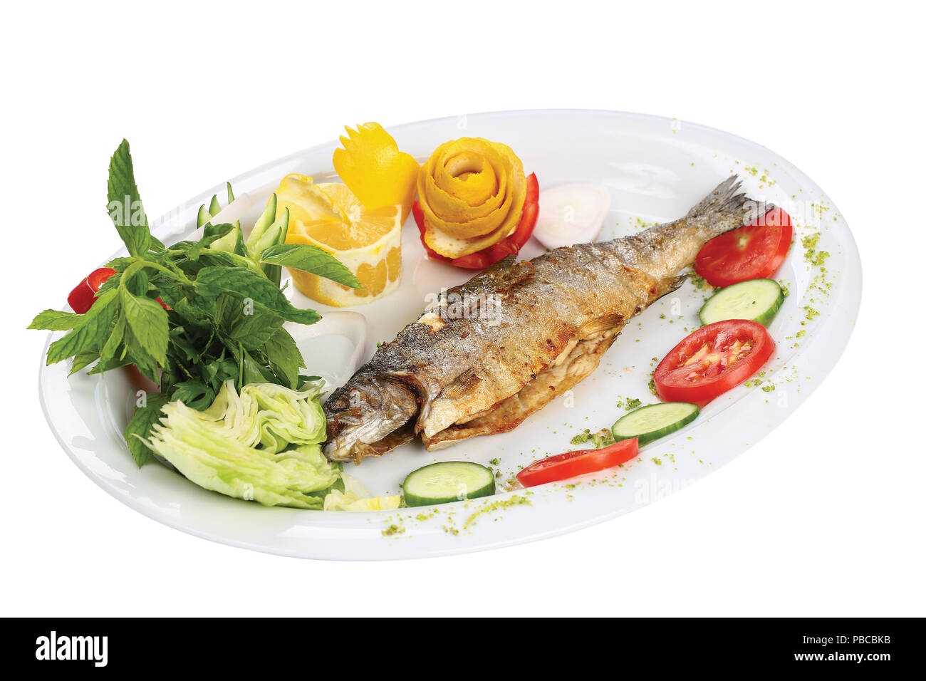 Grilled fish with vegetables Stock Photo - Alamy
