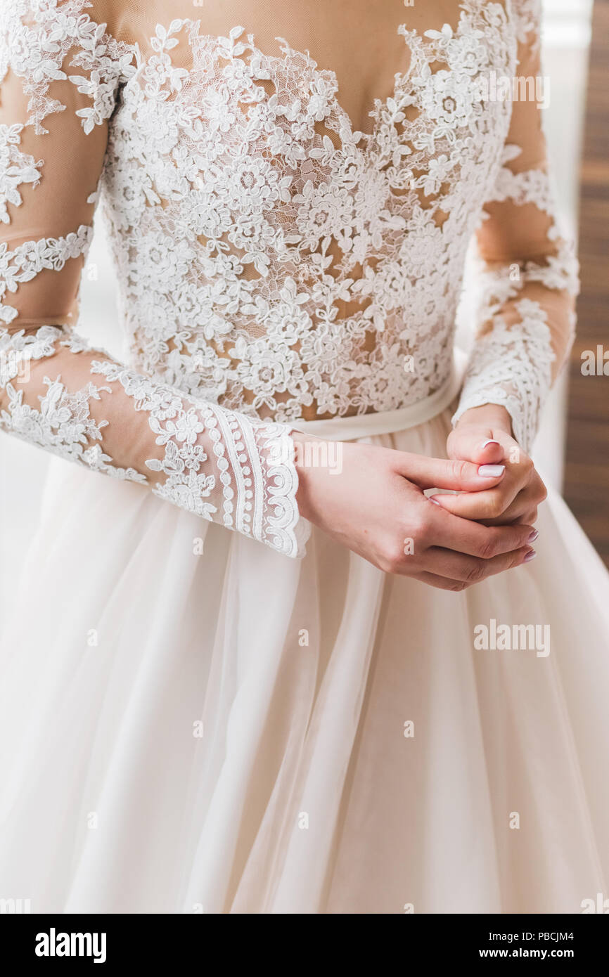 Lace details of white wedding dress ...
