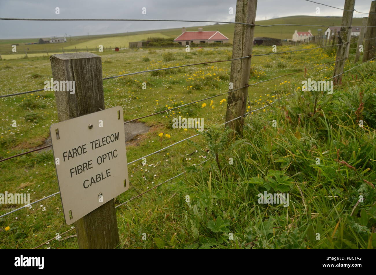 A marker sign for a fibre optic telecommunications cable in the Shetland Isles, UK Stock Photo
