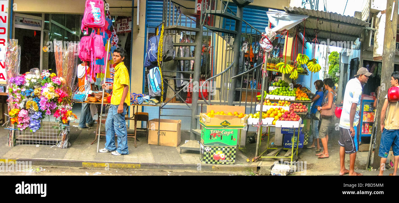 Port Louis, Mauritius - December 26, 2009: panorama of street life scene of Mauritius bazar in Port Louis, the capital of Mauritius Island, Indian Oce Stock Photo