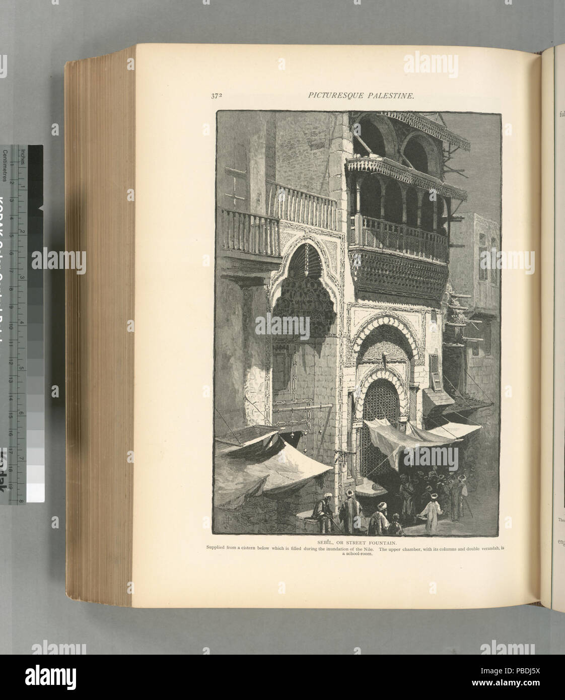 1303 Sebîl, or street fountain. Supplied from a cistern below which is filled during the inundation of the Nile. The upper chamber, with its columns and double veranda, is a school-room (NYPL b10607452-79717) Stock Photo