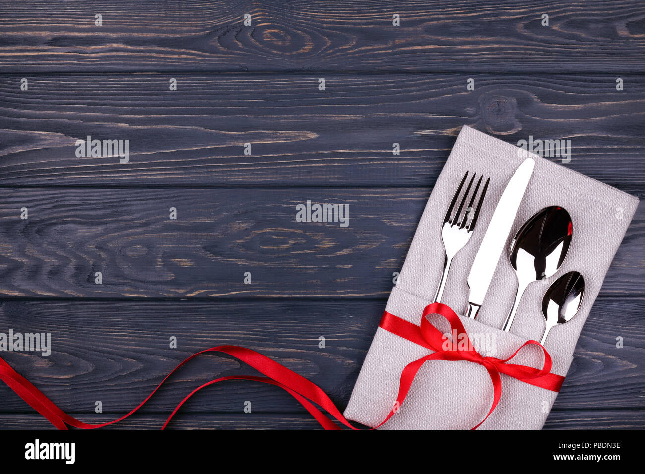 Spoon fork tied red ribbon hi-res stock photography and images - Alamy