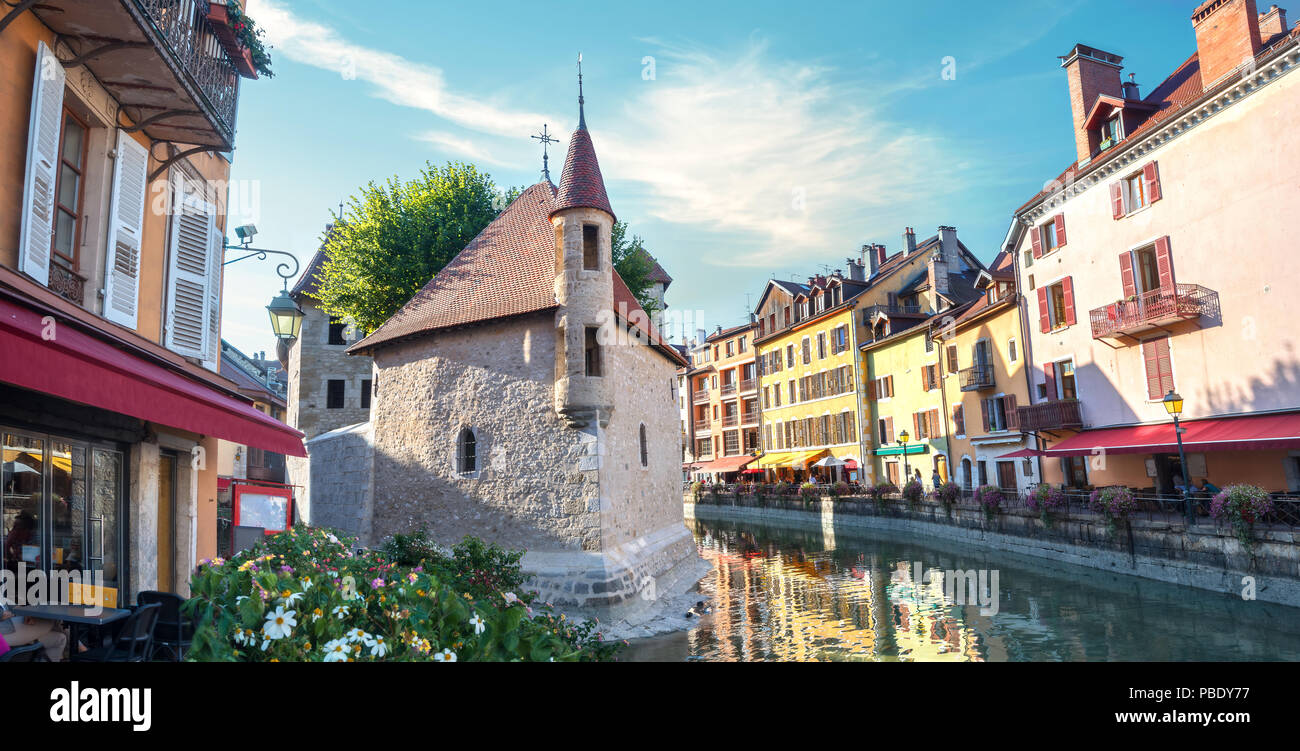 Panoramic cityscape with Thiou canal and  Palais de l'Isle in old town of Annecy. France Stock Photo