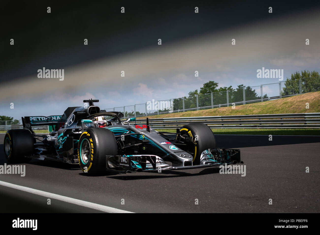 Mogyorod, Hungary.  27th July, 2018. Mercedes' British driver Lewis Hamilton steers his car during the first free practice of the Hungarian Formu1a one Grand Prix at Hungaroring in Mogyorod, Hungary on July 27, 2018. Credit: Jure Makovec/Xinhua/Alamy Live News Stock Photo