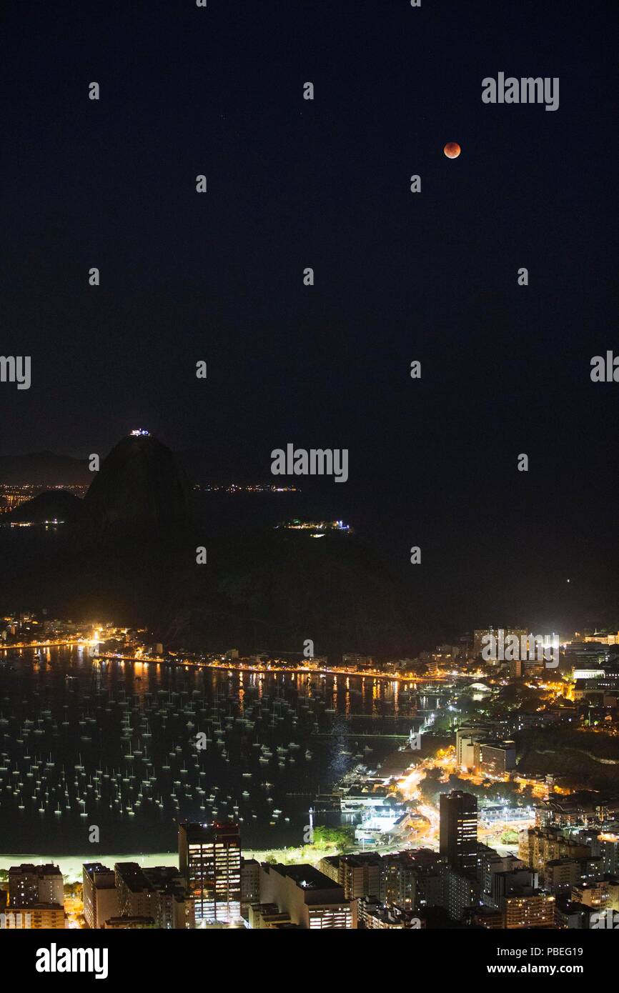 Rio De Janeiro, Brazil. 27th July, 2018. The moon is seen during a lunar eclipse in Rio de Janeiro, Brazil, July 27, 2018. Credit: Li Ming/Xinhua/Alamy Live News Stock Photo