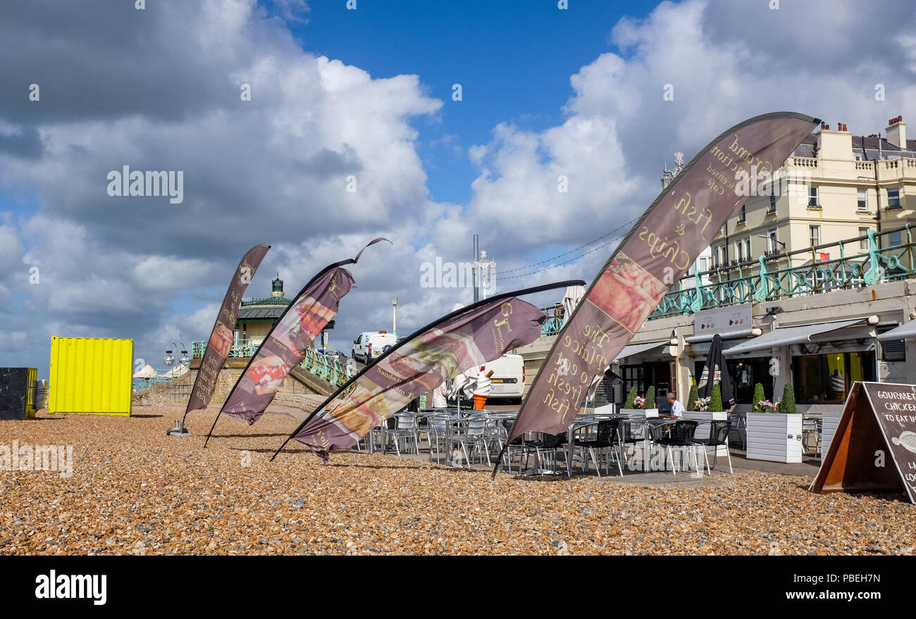 Brighton UK 28th July 2018 - A windswept Brighton seafront this morning after weeks of hot weather . Thunderstorms and wind have swept across Britain overnight after the recent heatwave conditions Credit: Simon Dack/Alamy Live News Stock Photo