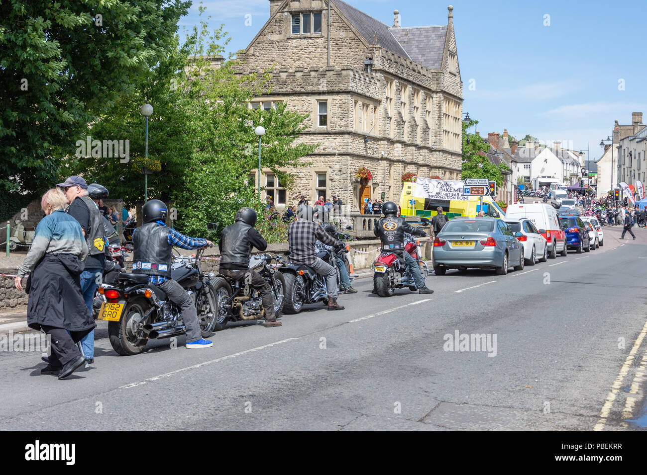 Calne, Wiltshire, UK, 28th July 2018  A group of bikes riding down the main street for the  Calne bike meet  Credit Estelle Bowden/Alamy live news Stock Photo