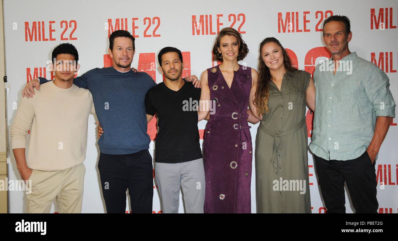 Los Angeles, CA, USA. 28th July, 2018. Carlo Alban, Mark Wahlberg, Iko  Uwais, Lauren Cohan, Ronda Rousey, Pete Berg at arrivals for MILE 22  Premiere, Four Seasons Hotel, Los Angeles, CA July