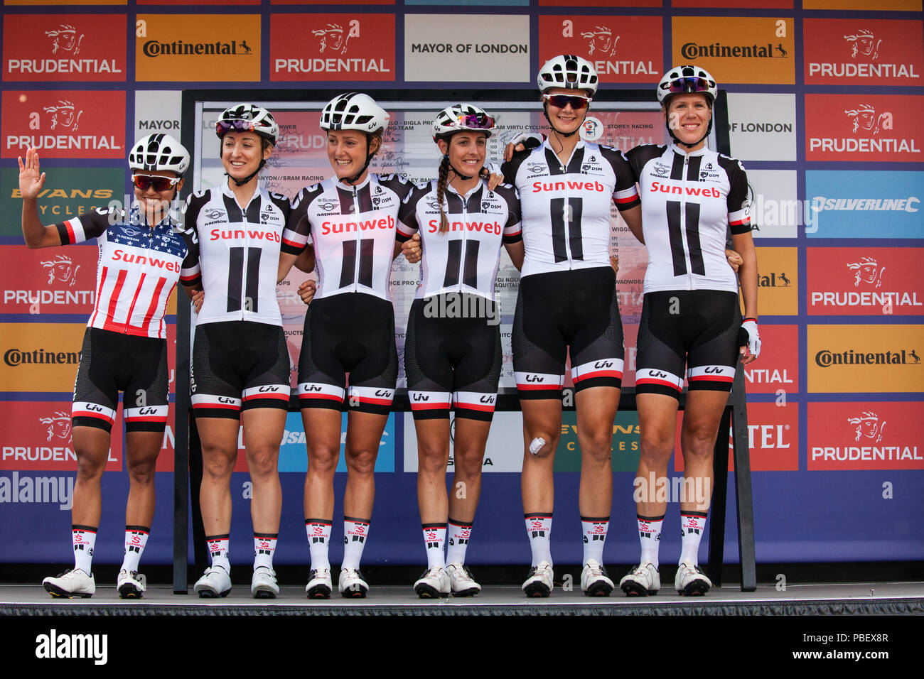 London, UK. 28th July, 2018. Elite riders from Team Sunweb, including reigning champion Coryn Rivera (l), prepare to compete in the Prudential RideLondon Classique, the richest women's one-day race in cycling. The race is part of the UCI Women's World Tour and offers spectators the opportunity to see the world's best women’s cycling teams battling it out over 12 laps of a closed 5.4km circuit starting and finishing on The Mall. Credit: Mark Kerrison/Alamy Live News Stock Photo