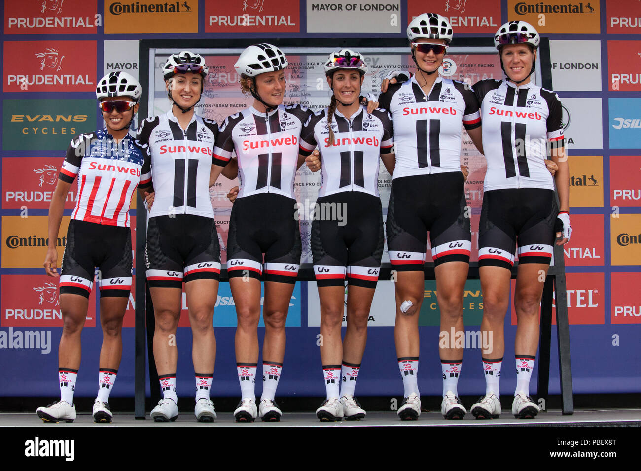 London, UK. 28th July, 2018. Elite riders from Team Sunweb, including reigning champion Coryn Rivera (l), prepare to compete in the Prudential RideLondon Classique, the richest women's one-day race in cycling. The race is part of the UCI Women's World Tour and offers spectators the opportunity to see the world's best women’s cycling teams battling it out over 12 laps of a closed 5.4km circuit starting and finishing on The Mall. Credit: Mark Kerrison/Alamy Live News Stock Photo
