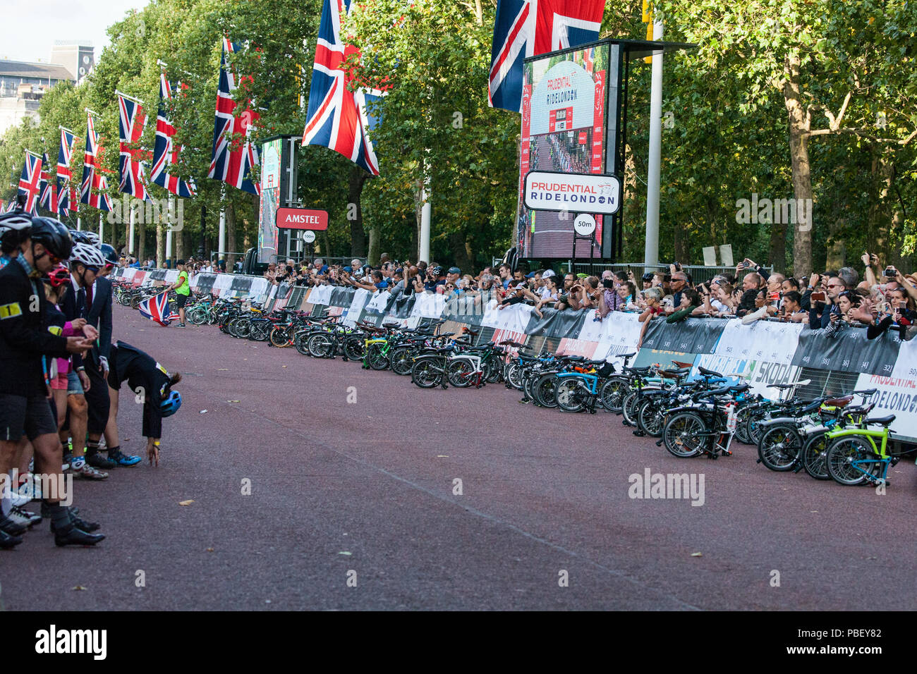 London, UK. 28th July, 2018. Over 500 smartly-dressed Brompton riders ...