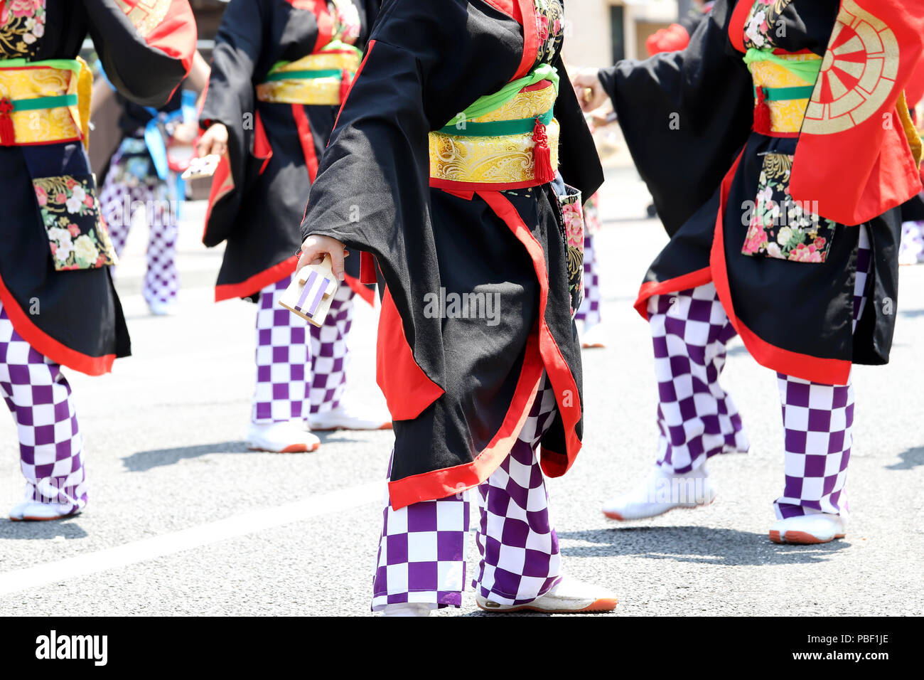 Japanese performers dancing in the famous Yosakoi Festival, yearly free public event. Yosakoi is a unique style of Japanese dance event Stock Photo
