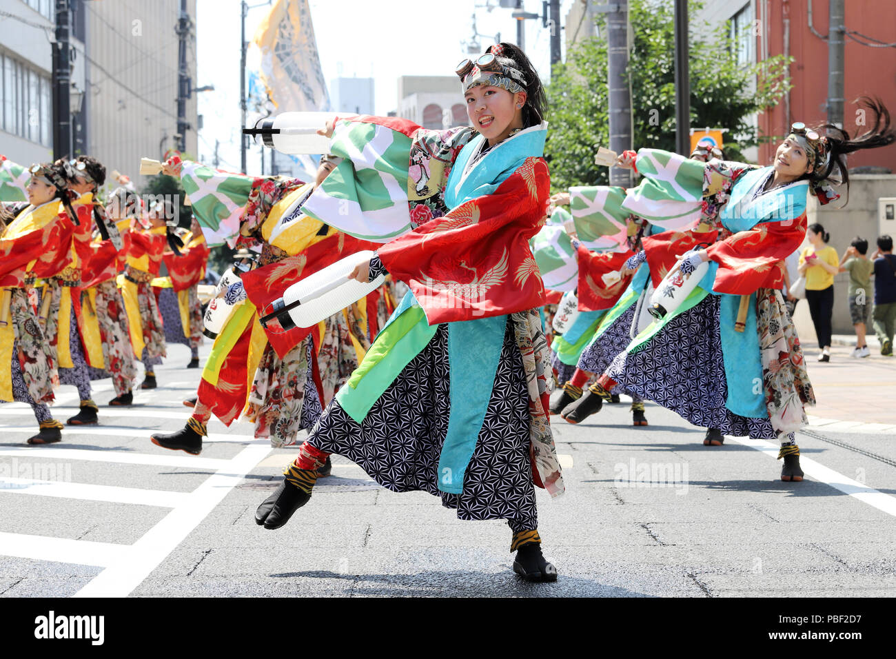 Festival with traditional dance, Japanese costumes and performances on Traf...
