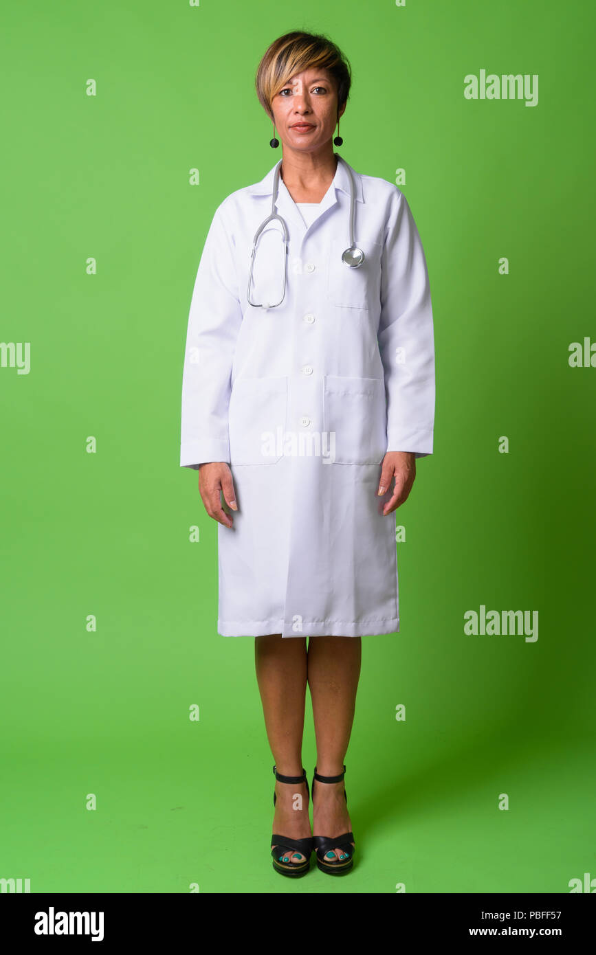 Female doctor green screen background hi-res stock photography and ...