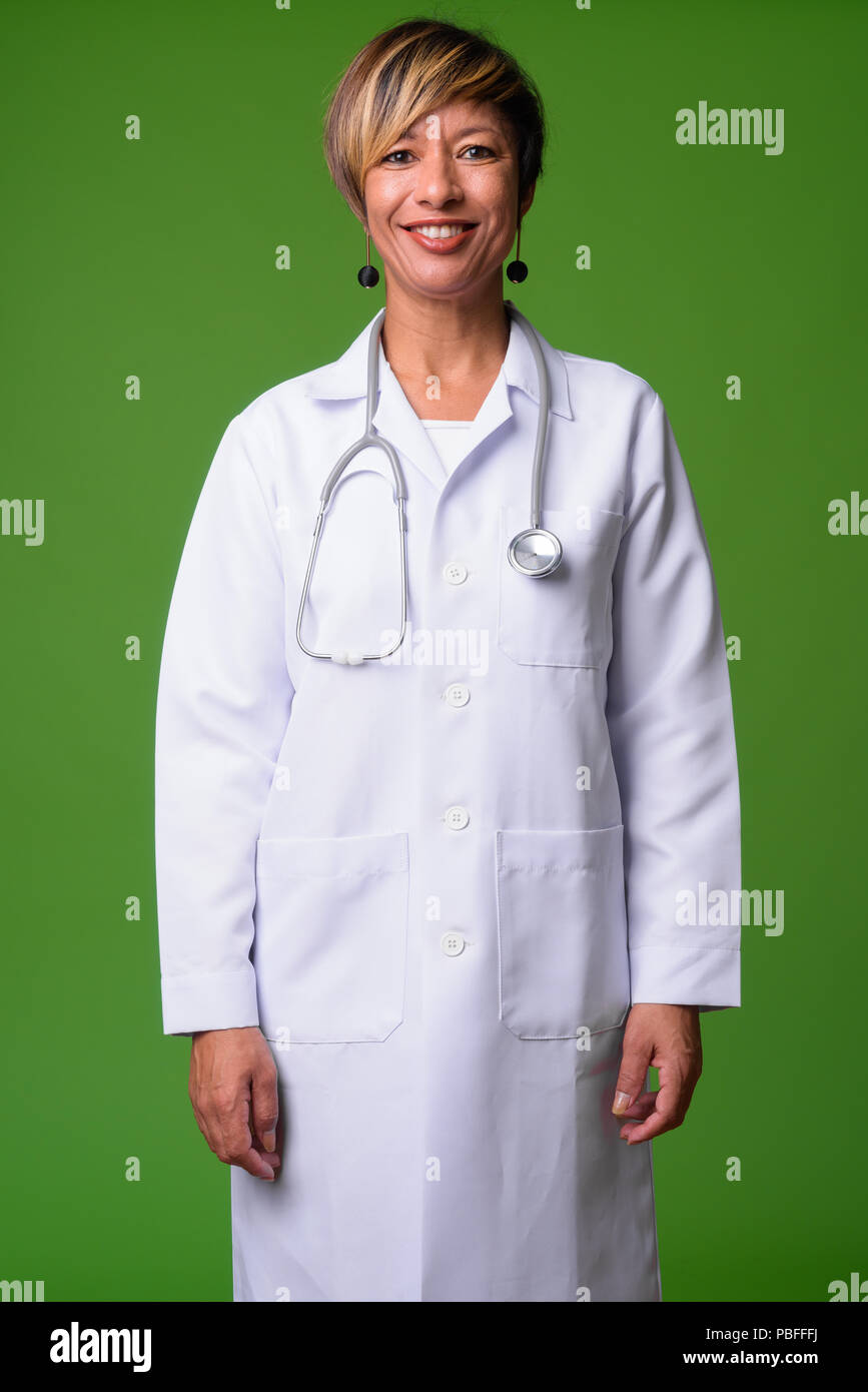Portrait smiling mature doctor isolated hi-res stock photography and ...